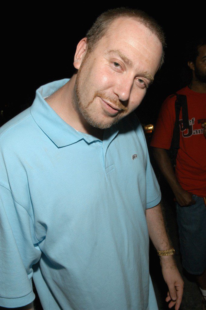 DJ Vlad Wearing Teal Shirt