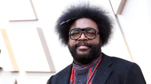 Questlove posing for a picture.