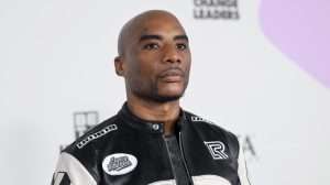 Charlamagne Tha God posing for a picture.