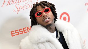 Jacquees wearing sunglasses