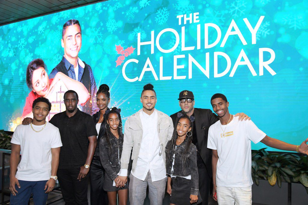 Diddy, Kim Porter, and family