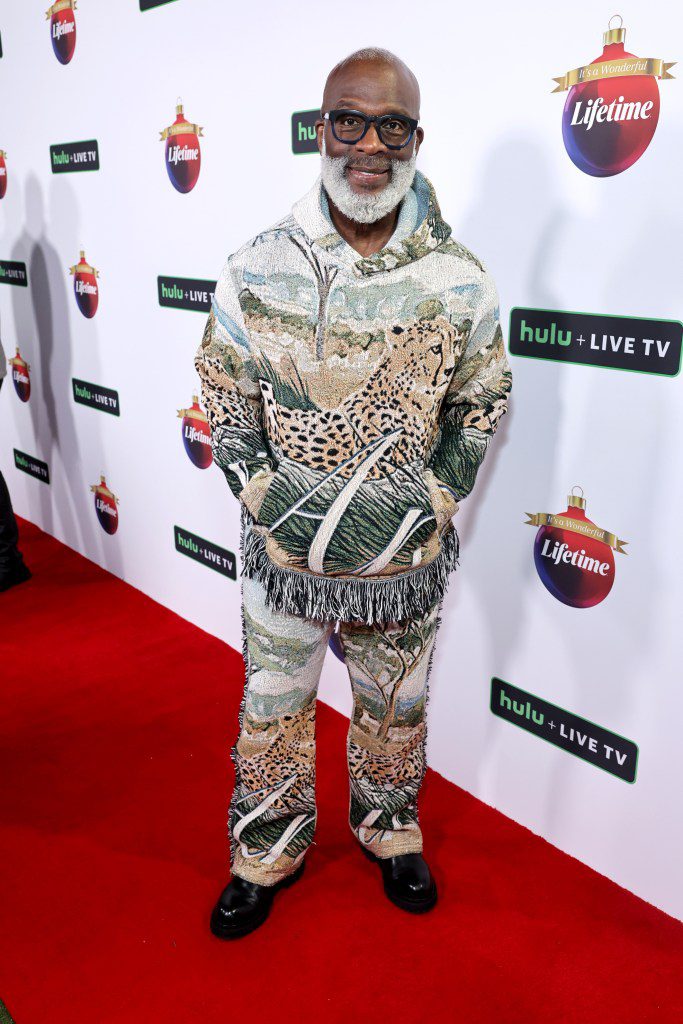 Bebe Winans wearing animal print