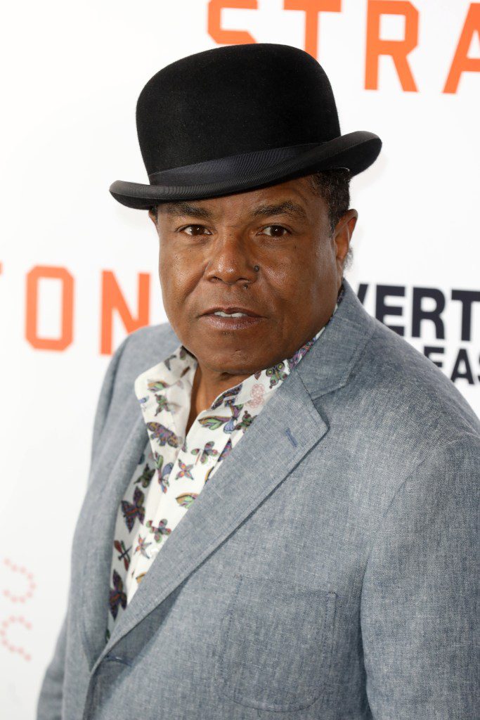 Tito Jackson wearing hat