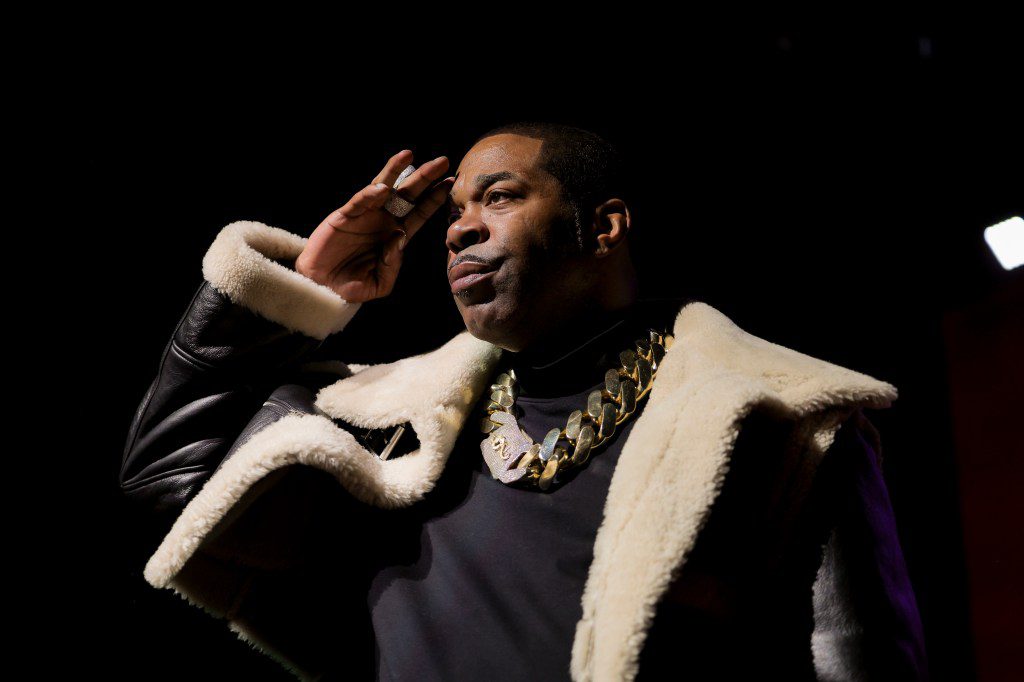 Busta Rhymes performing on stage at the Apollo Theater