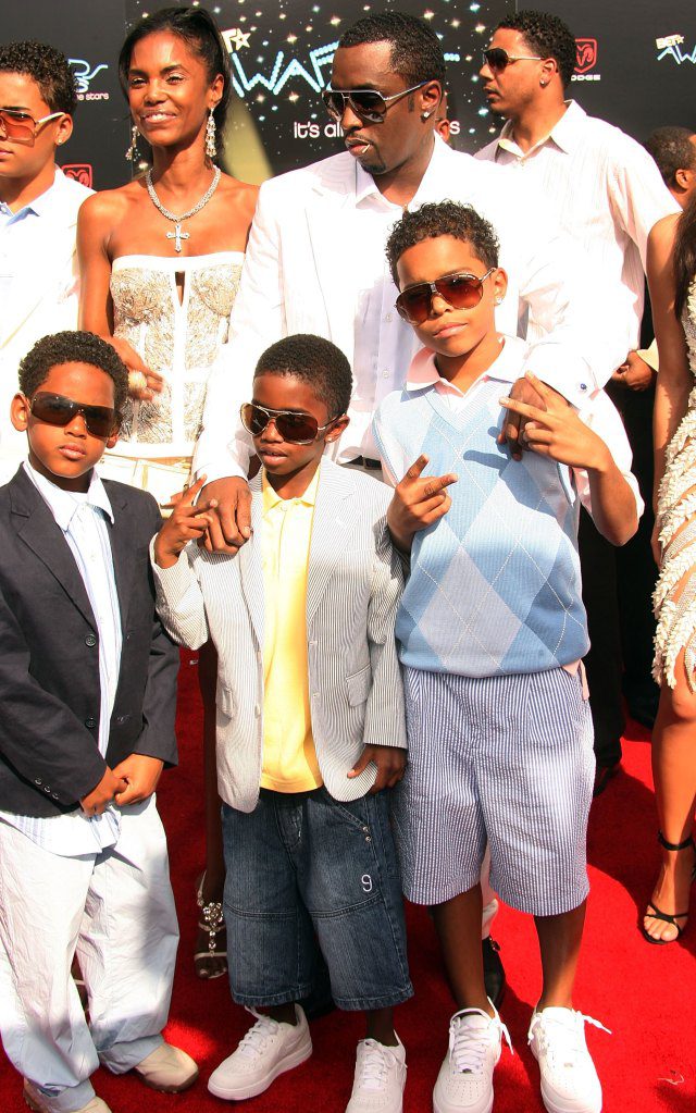 Rapper/Producer Sean 'P. Diddy' Combs (R-top), model Kim Porter (L-top) and kids