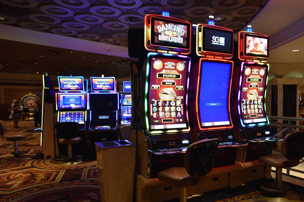 Slot machines with every other machine ready to play are ready for guests at Caesars Palace on the Las Vegas Strip.